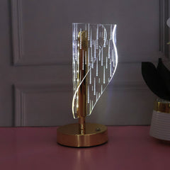 Close up of warm glowing crystal LED table lamp